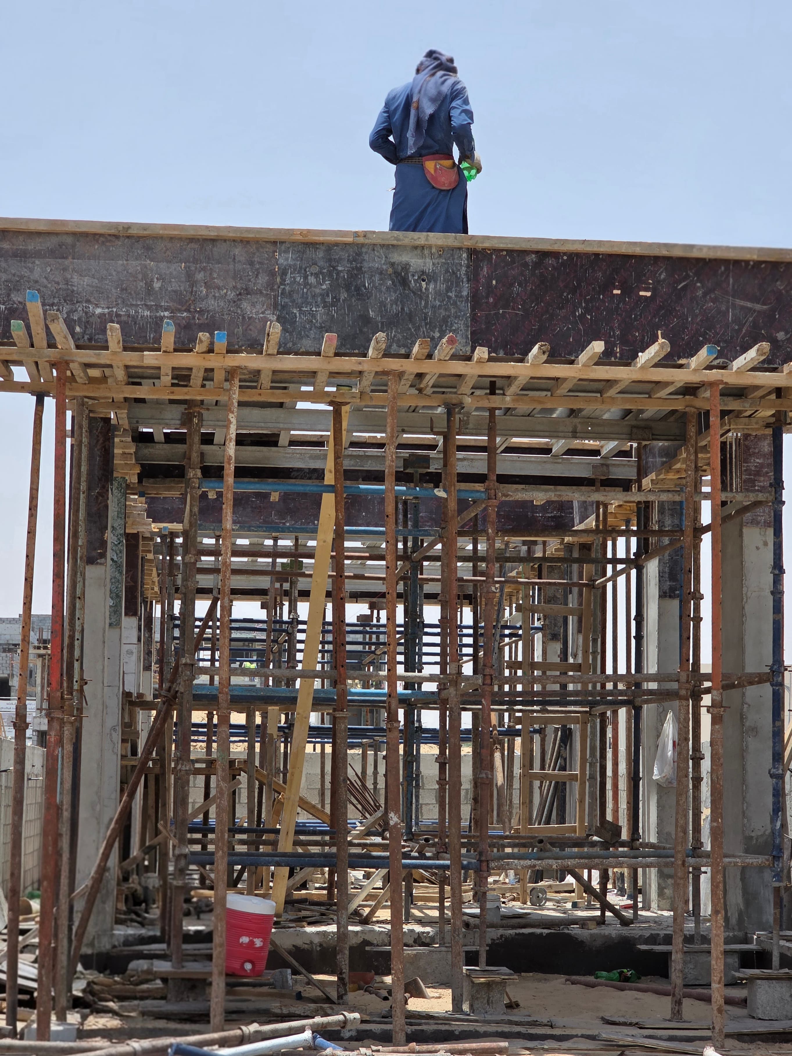 Slab formwork and timber falsework with site crew